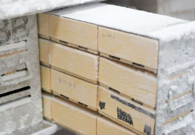 Boxes in a freezer drawer that is pulled out