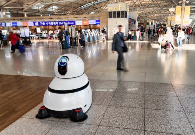 The airport cleaning robot in main hall of Incheon airport The airport cleaning robot in main hall of Incheon airport