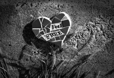 Heart-shaped mosaic reads “feel free” in New Orleans, after Katrina Heart-shaped mosaic reads “feel free” in New Orleans, after Katrina, illustrating a review of “Conflict Graffiti” by John Lennon