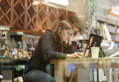 Young woman sitting in the cafe