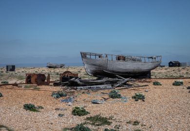 A wrecked boat on Dungeness beach A wrecked boat on Dungeness beach