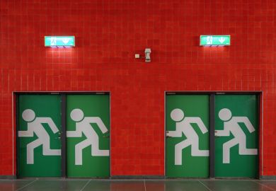 Exit signs at an underground station