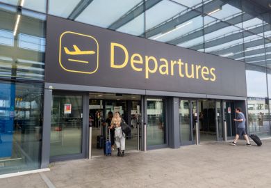 The sign for the departure hall of Gatwick Airport north terminal building