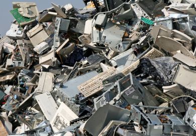 Heap of discarded computer parts in a dump