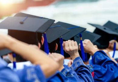 Graduates during commencement Graduates during commencement