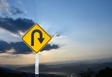 PIcture of a 'U-turn' road sign