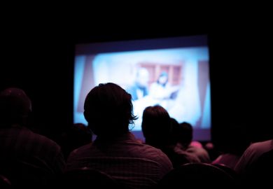 People watch film People watch film