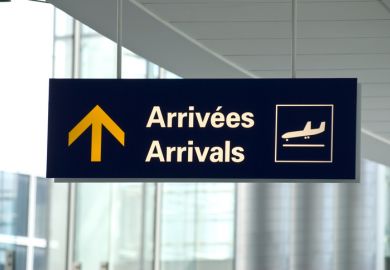 Arrivals sign at airport
