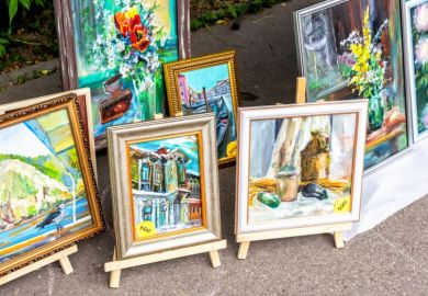 Artistic painting outdoors on a city street