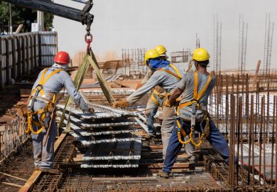 Men from the construction industry, working on the work of a building under construction. Men from the construction industry, working on the work of a building under construction.