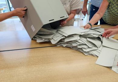 ballot papers are spread out from the ballot box for counting ballot papers are spread out from the ballot box for counting