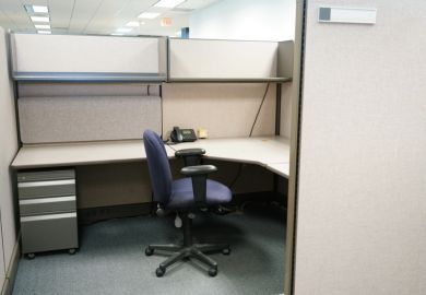 cubicle and office furniture in office room