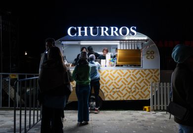 People queuing for churros at the night market in Sydney, Australia 