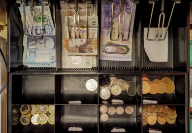 English and scottish banknotes money at till in glasgow 