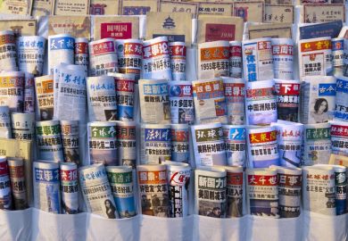 Chinese newspapers in a newsstand