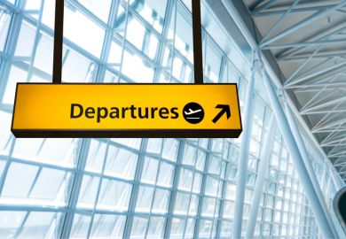 Departures sign at airport