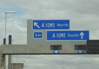 A road sign pointing to the north of England