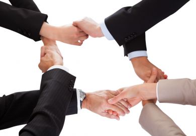 Intertwined handshakes symbolising overlap in interests and academic collaboration