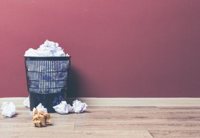 A full wastepaper basket A full wastepaper basket