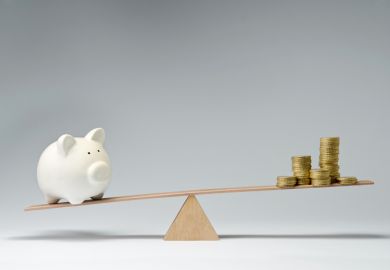 Piggy bank and money on a see-saw