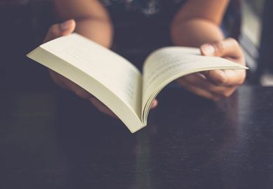 Woman reading a book Woman reading a book