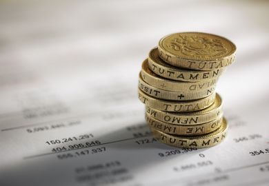 British pounds next to household bill