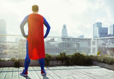 Superhero looking at view from city rooftop Superhero looking at view from city rooftop