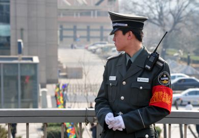 Chinese policeman guards in Beijing, China. 