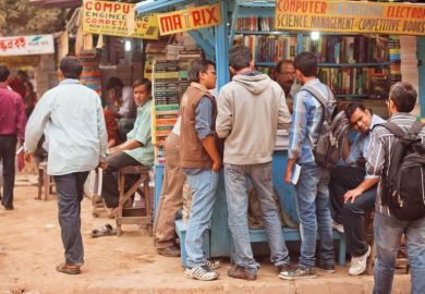 Students looking for the different books at outdoor book market on January 15, 2013.