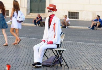 Street performer in 'invisible man' act