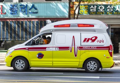 Ambulance goes on the city in Seoul - South Korea.