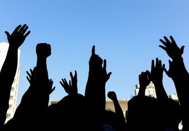 Group of people protesting or marching