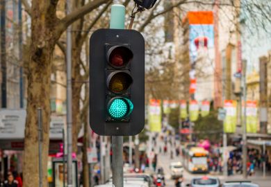 Traffic Light showing green in downtown Melbourne, Australia Traffic Light showing green in downtown Melbourne, Australia