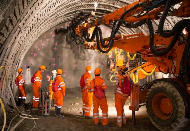 Engineers and workers examinating the construction of piperoof grouting for tunnel construction