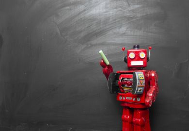 Robot by blackboard holding chalk Robot by blackboard holding chalk