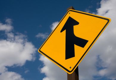 Merge left road sign