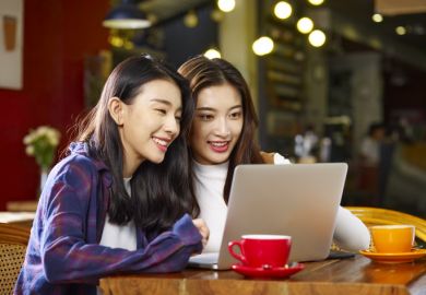 Students using laptop