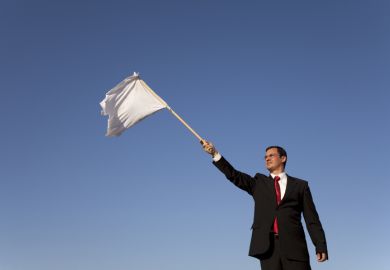 Man waving a white flag