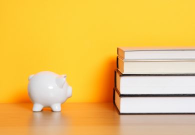Piggy bank and books