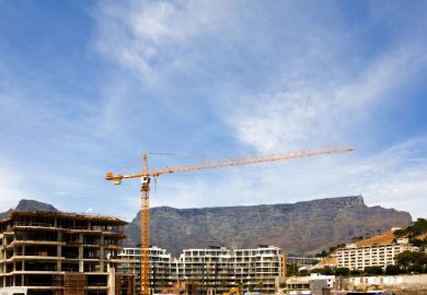 Table Mountain behind a construction site in Cape Town, South Africa