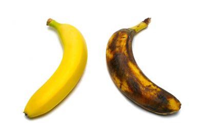 Two bananas: one yellow, one brown Two bananas: one yellow, one brown