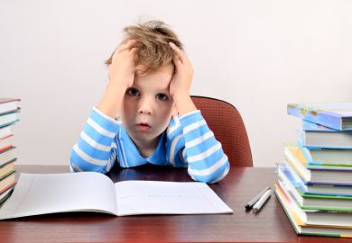 Boy struggling with schoolwork Boy struggling with schoolwork