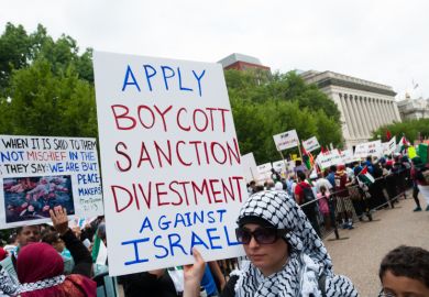 Demonstrators march on the White House in Washington, D.C., to protest Israel's offensive in Gaza, August 2, 2014
