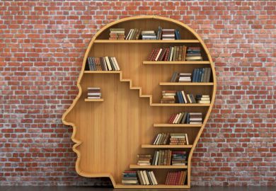 Books on head-shaped shelving