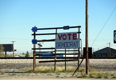 Sign supporting the Democratic Party on a shabby rack beside the road Sign supporting the Democratic Party on a shabby rack beside the road