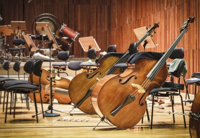 Cellos in an empty auditorium