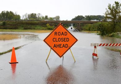 A road closed sign illustrating course closures