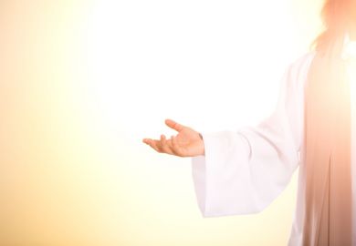 Jesus, his arms outstretched