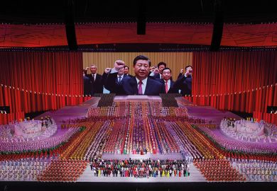 A large screen showing President Xi Jinping during the art performance celebrating the 100th anniversary of the founding of the Communist Party of China on June 28, 2021 in Beijing, new Cold War.