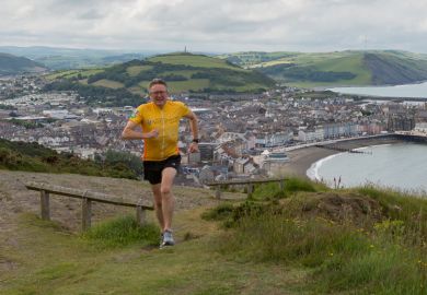 John Grattan running Ironman